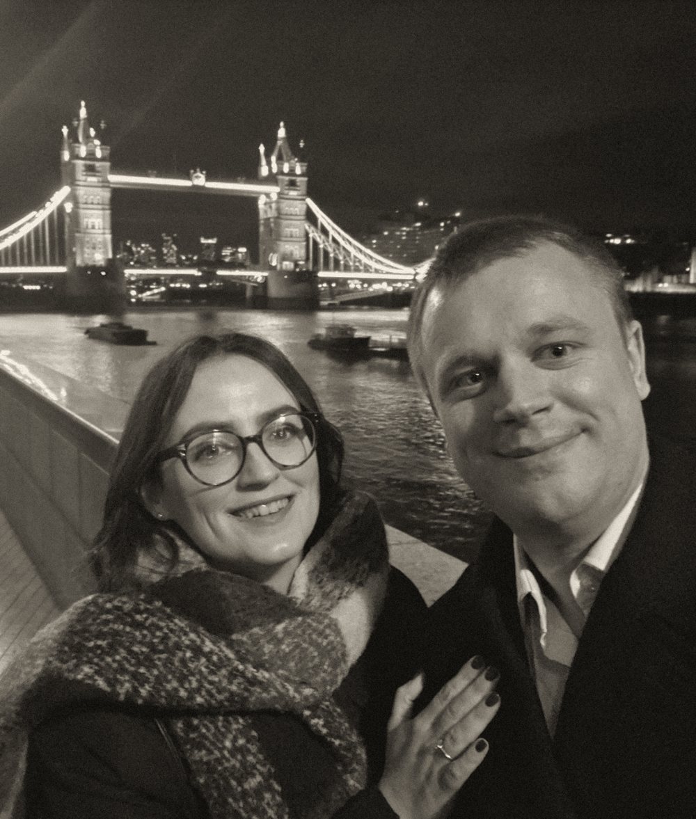 Evelina and Michael by Tower Bridge at night